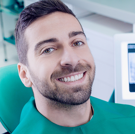 smiling man at the dentist